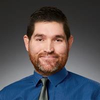 portrait of Jason David Troha, FNP