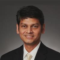 portrait of Radhakrishnan G Nair, MD