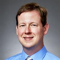 portrait of Ryan Woodham, MD