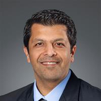 portrait of Aman Sibal, MD
