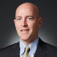 portrait of Travis Caudill, MD