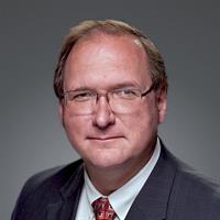 portrait of Joe David Hnatek, MD